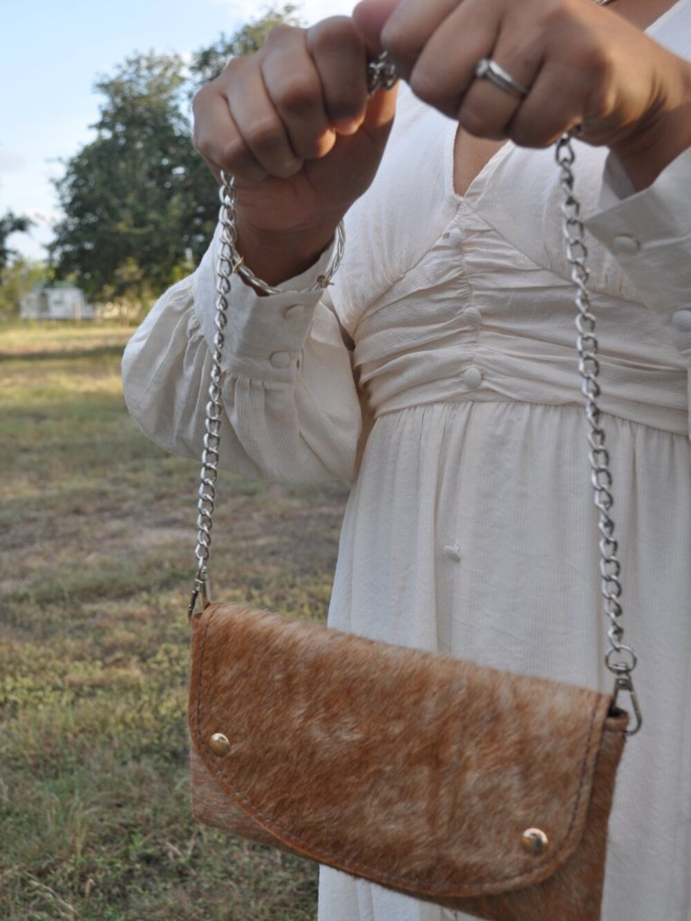 🤎 Genuine Cowhide Crossbody / Clutch — $100